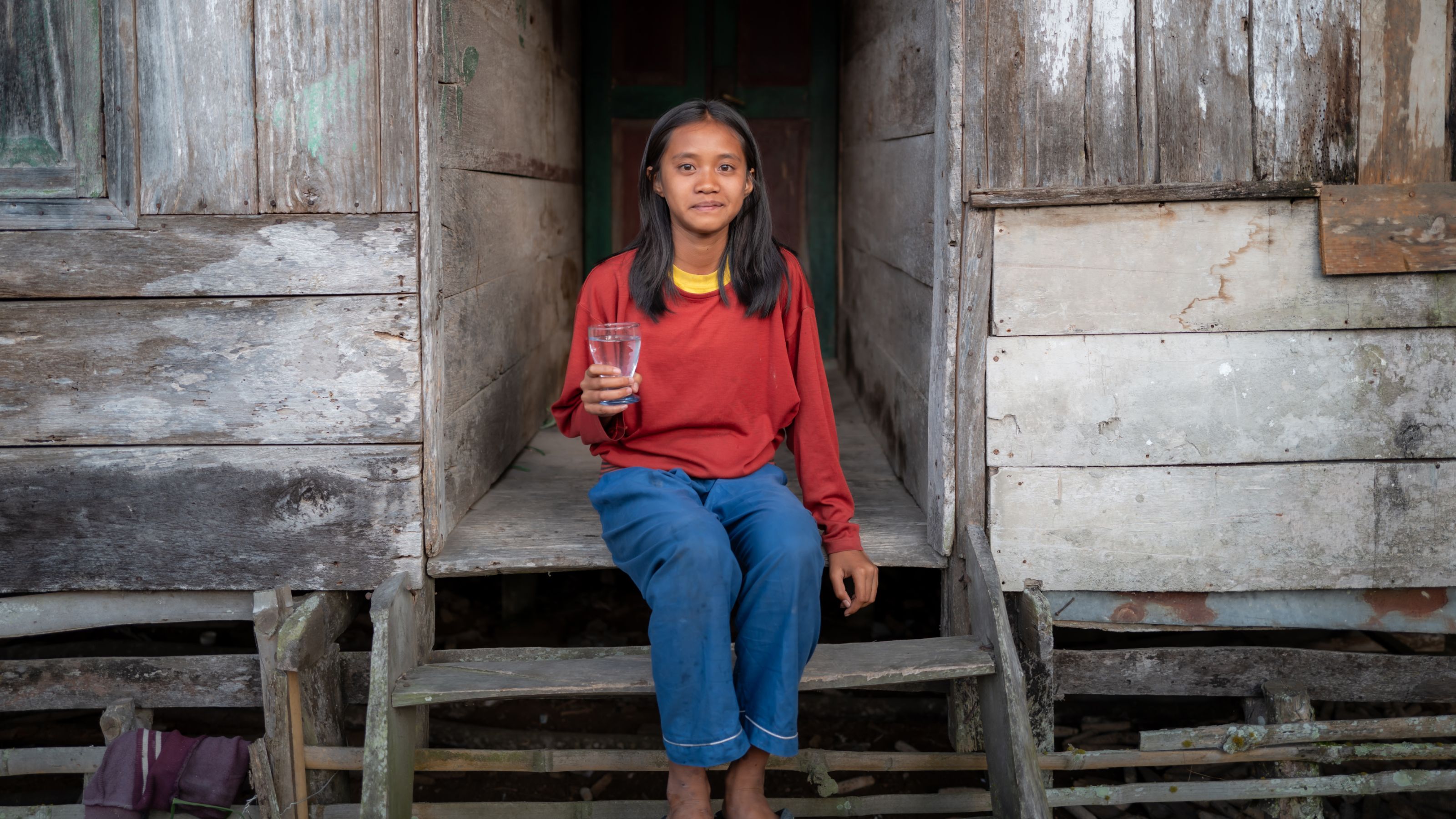 Woman holding safe, clean water